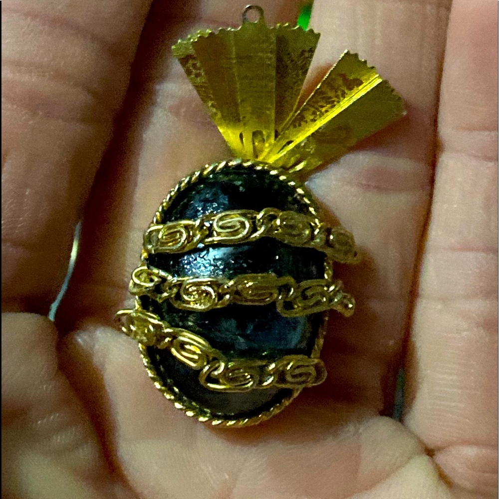 Two golden pineapple cuff links